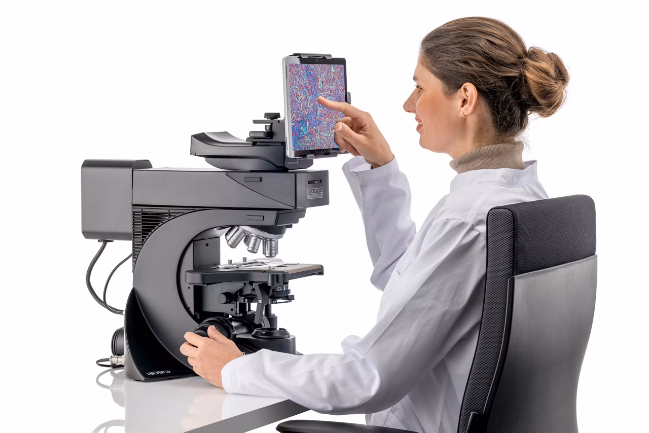 User Operating LeicaVisoria B Lab Microscope Kid21776837